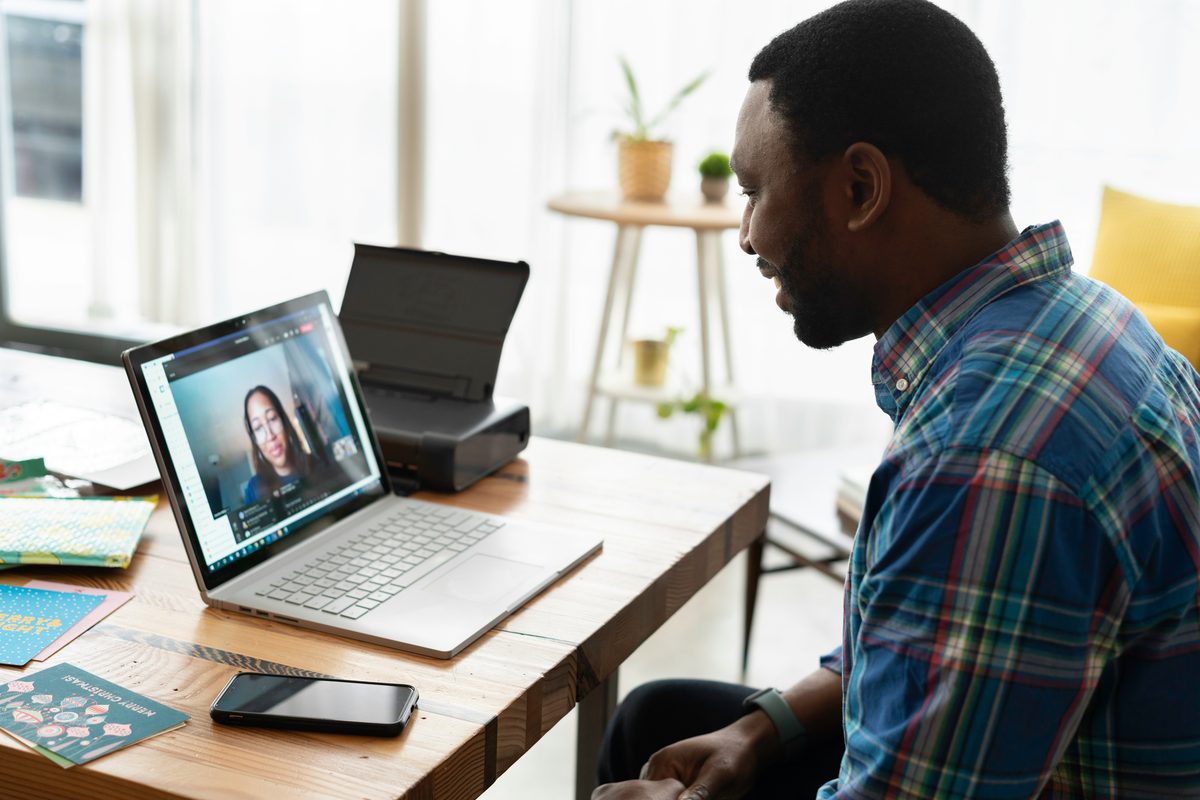 A person taking part in an assessment by secure video call from home